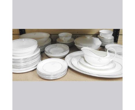 A Royal Doulton Carnation pattern bone china tea and dinner service, to include meat plates