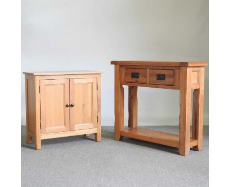 A modern light oak side cabinet, together with an oak side table, with two drawers, 91cm wide (2)