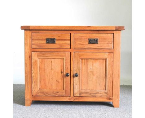 A modern light oak side cabinet99w x 47d x 80h cm