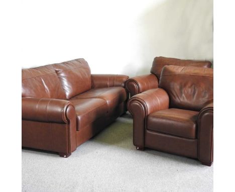 A modern brown leather three piece suite, comprising a sofa, 220cm wide and a pair of armchairs (3)