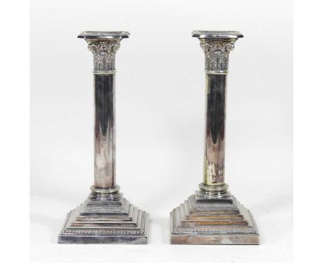 A pair of early 20th century silver plated table candlesticks, 25cm highOverall condition looks to be complete and usable. Th