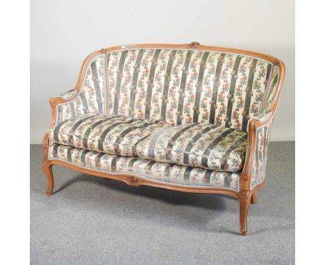 An early 20th century French show frame sofa, with striped upholstery135w x 79d x 93h cm