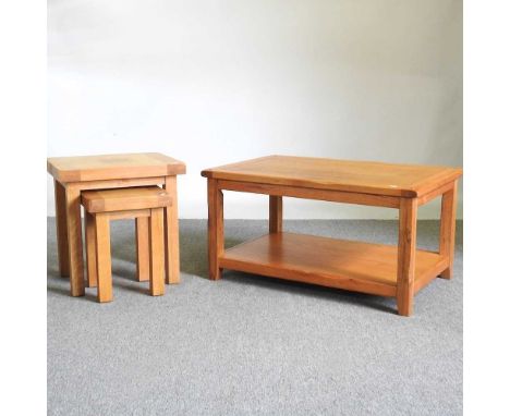 A modern light oak coffee table, 92cm wide, together with a nest of two matching occasional tables (3)92w x 61d x 48h cm