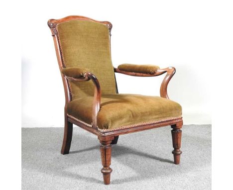 A William IV upholstered rosewood and mahogany elbow chair, on turned and fluted legsOverall condition is complete and usable