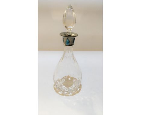 An Art Nouveau enamelled pewter mounted glass liquer jug, with stopper, unmarked, 22cm high