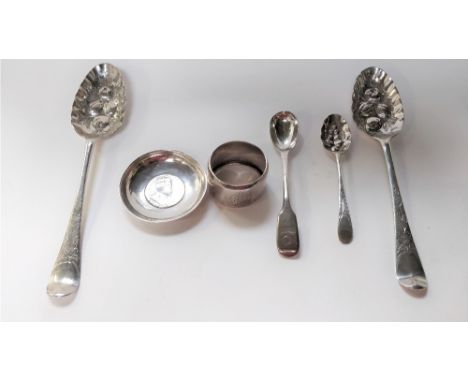 A pair of silver berry spoons, both Georgian bottom marked spoons, with later decoration in the usual manner, 20.5cm long; a 