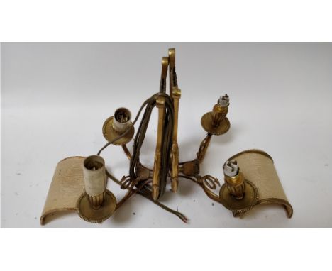 A pair of gilt metal gilded wall lights, each in the form of a harp