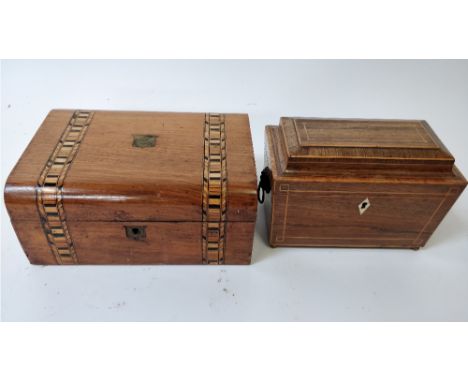 A 19th century rosewood tea caddy, with lion face handles, along with a sewing box