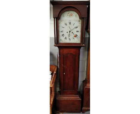 A longcase clock in a mahogany case, with a painted face and eight movement