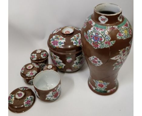 A Chinese six piece ceramic set comprising one single vase and five storage jars and covers, probably Yung - Ching period