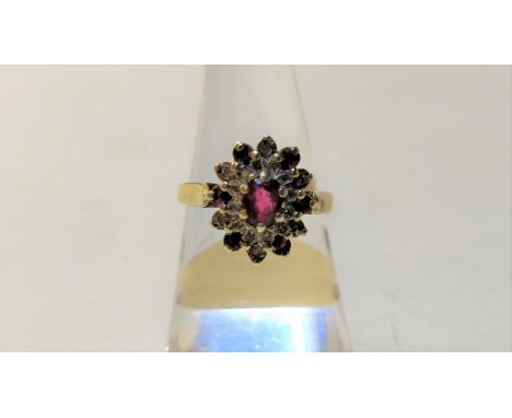 A ruby and single cut diamond set gold cluster ring, finger size N, 3.3 g gross