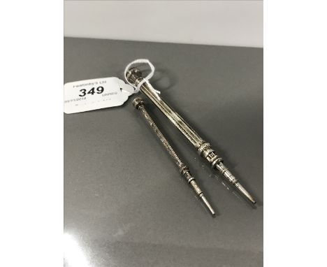 2 WHITE METAL VINTAGE PENCILS