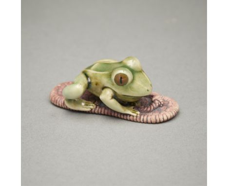 Armin Muller (American, b. 1930). Celadon glazed porcelain with bisque netsuke titled "Frog on a Sandal," carved in 1993.Prov