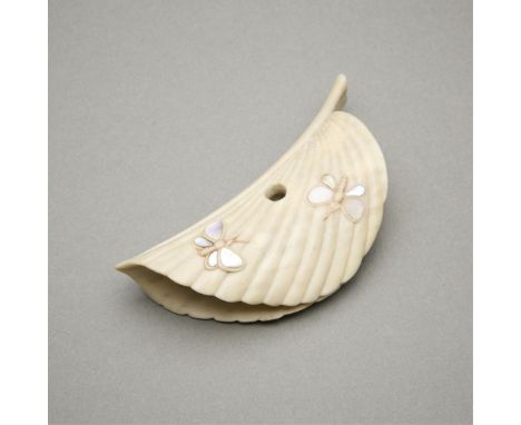 Clive Hallam (British, b. 1965). Carved Sika stag antler netsuke titled "Leaf," carved 1993. In the form of a leaf with mothe