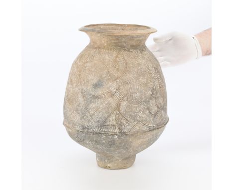 Thai Ban Chiang ceramic ovoid storage jar with everted rim, tall recessed foot, and incised decoration throughout, Neolithic 