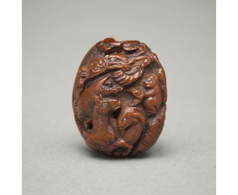 Toryusai Kozan (Japanese, 1787-ca.1854). Mid-19th century Japanese carved seed pit ojime. Carved with zodiac animals with inl