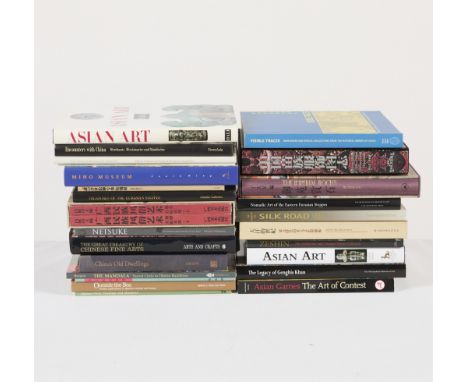 Group of assorted Asian art books covering topics including Japanese netsuke, Tibetan mandalas, Chinese scholar's rocks, and 