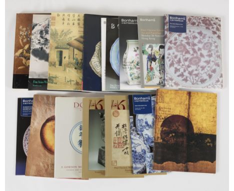 Group of various assorted Asian art auction catalogs including: Bonhams, Butterfield &amp; Butterfield, and Doyle.Provenance: