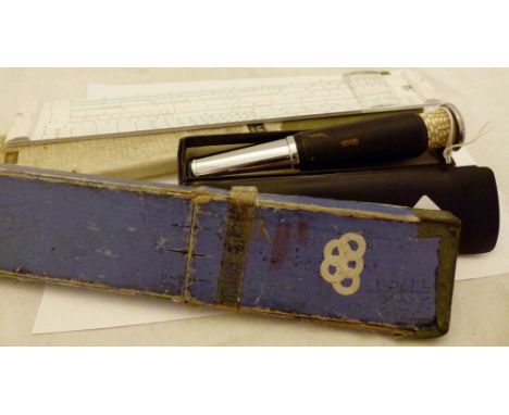Three vintage slide rules and a Otis King calculator model L