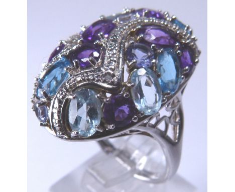 Silver dress ring with Topaz and Amethyst stones 