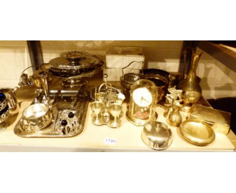 Shelf of mixed metalware