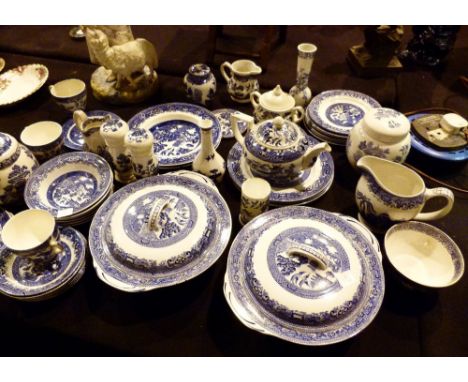 Shelf of blue and white ceramic dinnerware