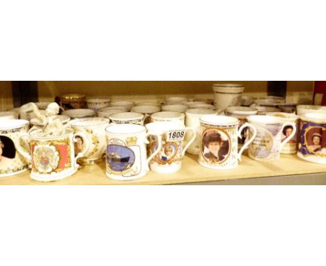 Shelf of mainly porcelain commemorative mugs mostly Royalty 