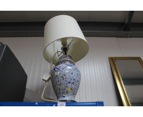 A baluster table lamp and shade