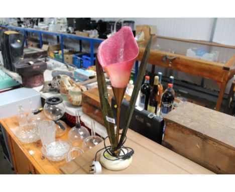 A decorative table lamp in the form of a flower