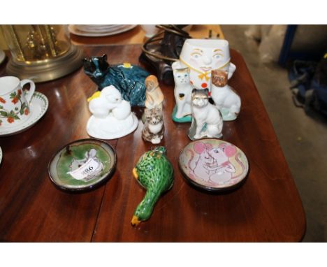 Two Chelsea Pottery dishes, cat ornaments, Russian monkey ornament, a Poole Pottery harvest mouse and a Pool badger etc.