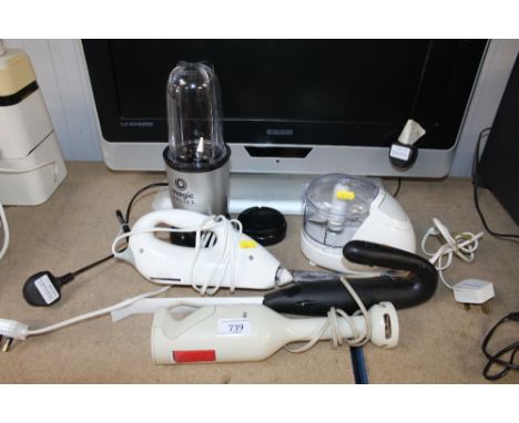 A Magic Bullet together with a Kenwood electric herb grinder; meat carvers etc
