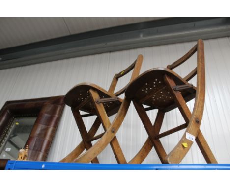 A pair of vintage child's folding chairs