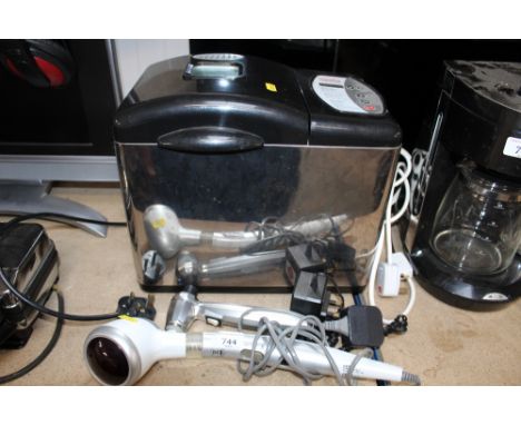 A Morphy Richards bread maker; a hand held heat lamp etc