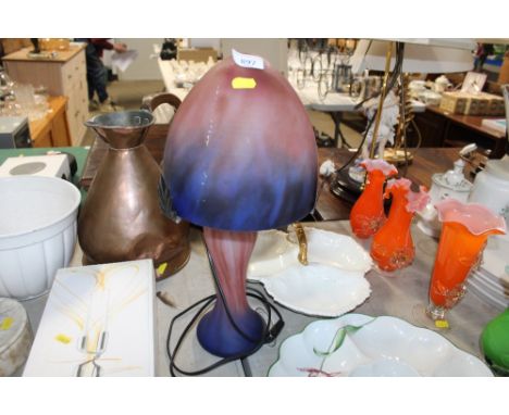 A decorative glass table lamp 