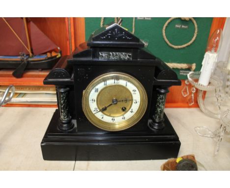 A slate two hole mantel clock