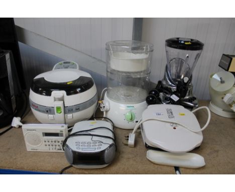 A Kenwood smoothie maker; a George Foreman and a Tefal steamer; a Technika radio alarm clock; Roberts portable radio and a Te