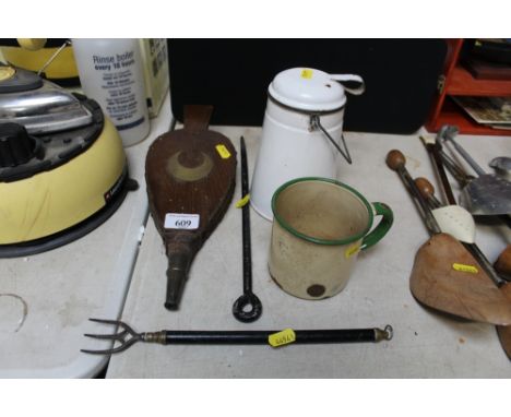 A small pair of bellows; toasting fork; enamel mug; enamel swing handled storage jar etc