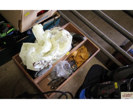 A wooden box containing various hand tools and fixings etc.