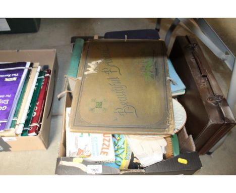 A box containing various items to include china; books; vintage games; brushes; postcard albums lacking contents etc