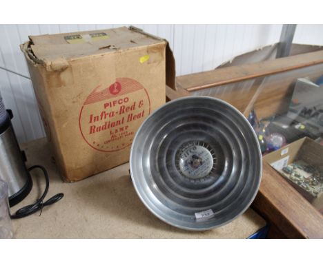 A Pifco infrared heat lamp, sold as collectors item