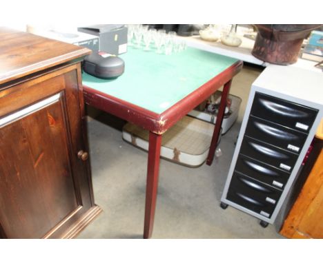 A folding card table