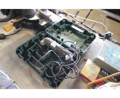 A Bosch PMF220CE multi tool in fitted plastic case