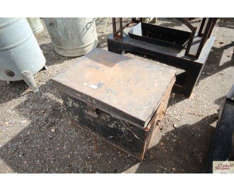 A metal trunk and a gypsy caravan model