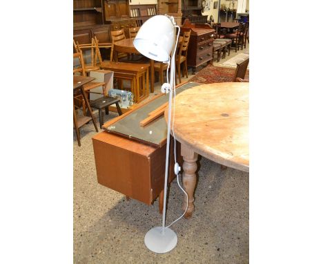 Floor standing adjustable lamp