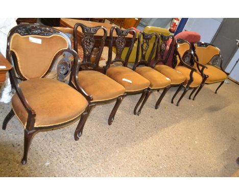Edwardian parlour or salon suite comprising a two seater sofa, a pair of chairs and four further dining chairs, all upholster