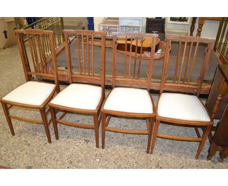 Set of four Edwardian stick back chairs