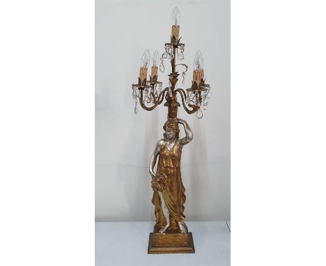 Mid 20thC ceramic lamp in the form of a lady with a bouquet of flowers,The lamp stamps 91 cm 