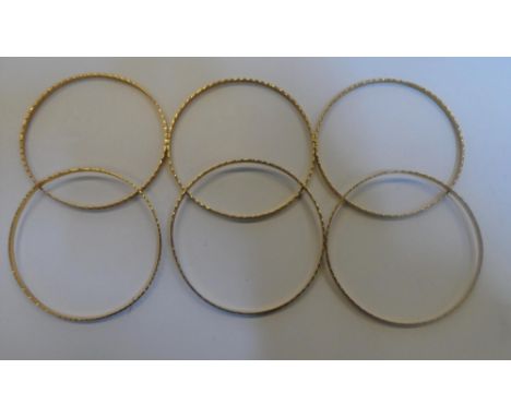 6, 9ct yellow gold thin ladies bangles, total weight 36 grams,Each bangle has a 7 cm diameter 
