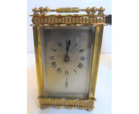 Cased antique brass cased carriage clock timepiece,Believed to be in full working order