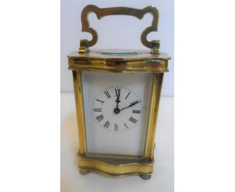Unmarked antique brass carriage clock (with key)Believed to be in full working order12 cm high 